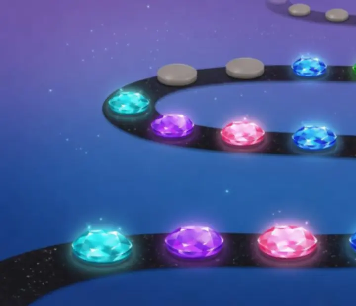 Pályaválasztó képernyő a Jewels Legend játékban színes szintekkel